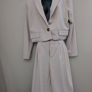 Classy women business suite, cream color - would work well for holiday party